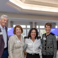 Mike and Sue Jandernoa, Stephanie Hurwitz, Margy Jones, and Jane Becker standing together posing for photo